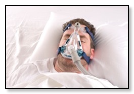 man sleeping with uncomfortable CPAP mask