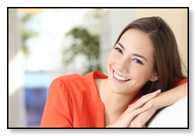 pretty woman smile with nice dental crowns